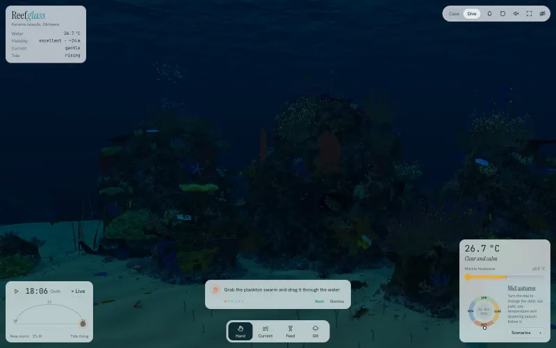 The same reef at dusk: the water deep blue and the light fading.